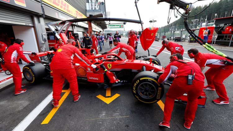 Vettel wins in Belgium to rein in Hamilton