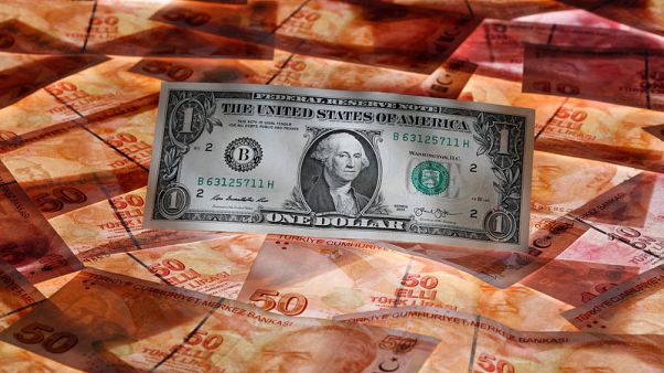 Turkish lira weakens against dollar, minister warns on sanctions Turkish lira weakens against dollar, minister warns on sanctions