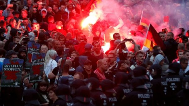 Manifestations anti-étrangers: Merkel dénonce "la haine dans la rue" Manifestations anti-étrangers: Merkel dénonce "la haine dans la rue"