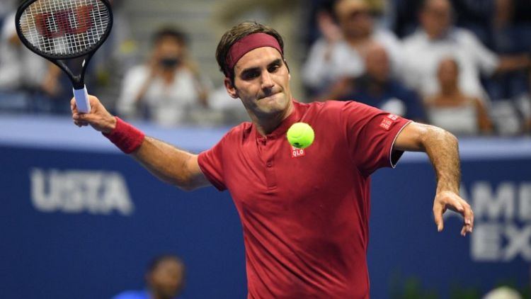 Federer makes short work of Nishioka in clammy New York