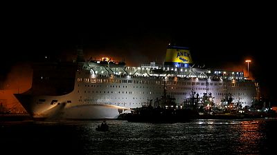 Greek passenger ferry docks at Piraeus after fire; no injuries reported