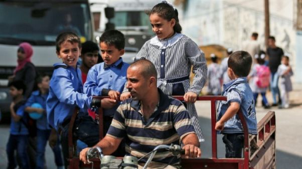 Les enfants palestiniens reprennent l'école malgré les coupes budgétaires américaines Les enfants palestiniens reprennent l'école malgré les coupes budgétaires américaines