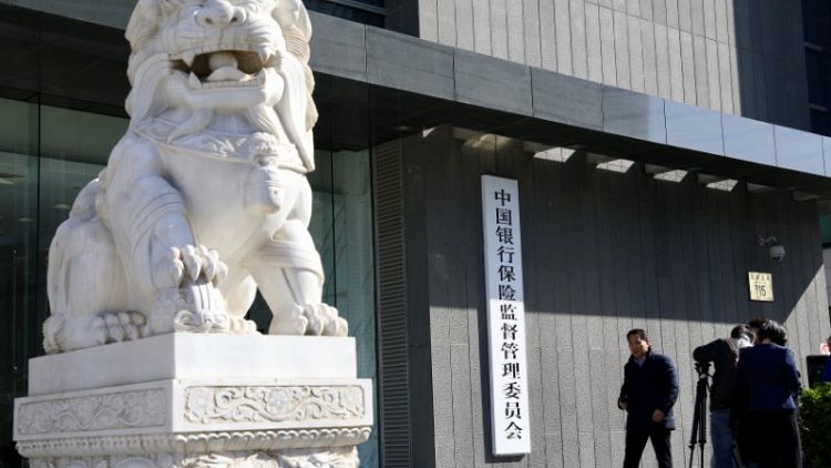 China bank regulator says will push forward with deleveraging