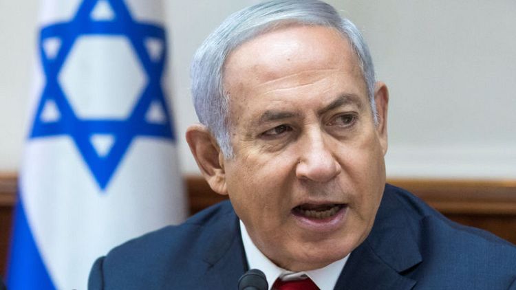 At Dimona reactor, Netanyahu warns Israel's foes they risk ruin