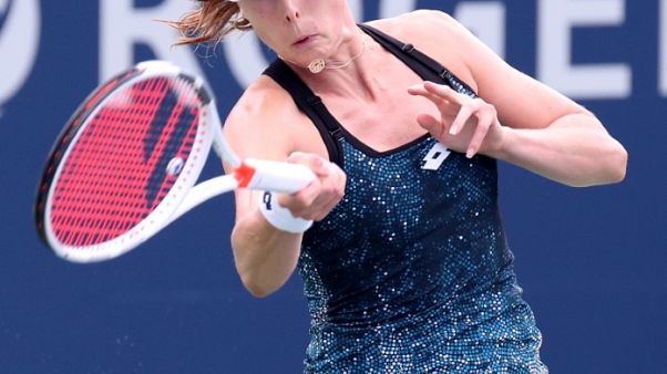 U.S. Open regrets Cornet's warning for shirt change U.S. Open regrets Cornet's warning for shirt change
