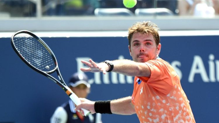 Wawrinka tames heat and young Frenchman at U.S. Open