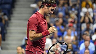 Federer in daytime action on U.S. Open day four