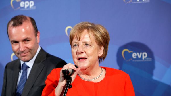 Merkel backs Bavarian ally as centre-right's EU Commission candidate - media Merkel backs Bavarian ally as centre-right's EU Commission candidate - media