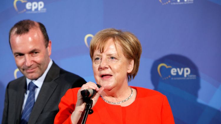 Merkel backs Bavarian ally as centre-right's EU Commission candidate - media