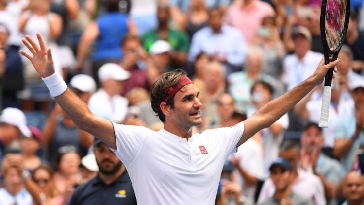 Federer cruises into U.S. Open third round