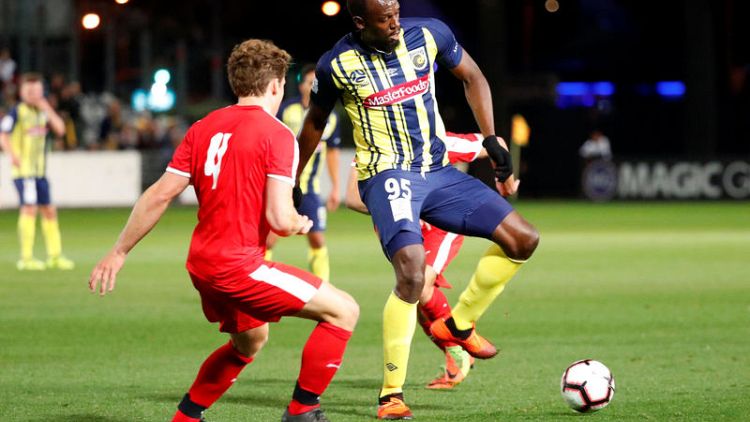Olympic champ Bolt makes modest Mariners debut in friendly