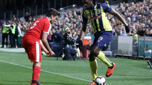 Australie: Usain Bolt fait ses débuts de footballeur, mais manque de rythme Australie: Usain Bolt fait ses débuts de footballeur, mais manque de rythme