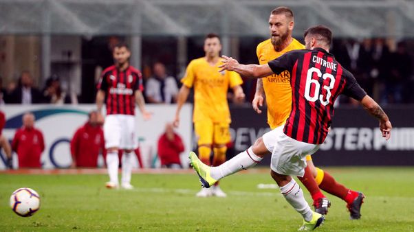 Last-gasp Cutrone goal gives Milan 2-1 win over Roma Last-gasp Cutrone goal gives Milan 2-1 win over Roma