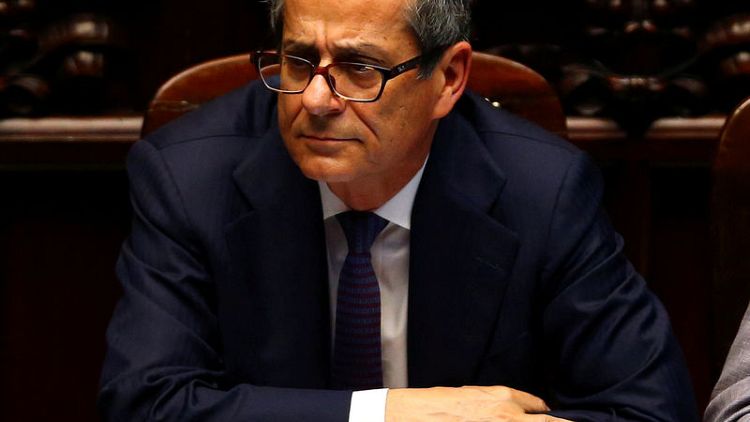 Italy, after Fitch cuts outlook, vows to respect EU commitments