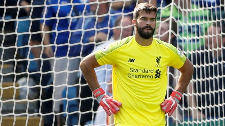 Liverpool survive Alisson howler to continue winning start