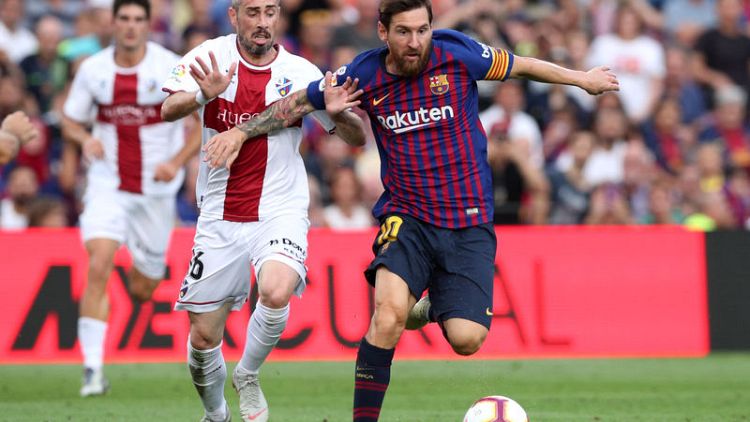 Messi and Suarez show no mercy as Barca humiliate Huesca