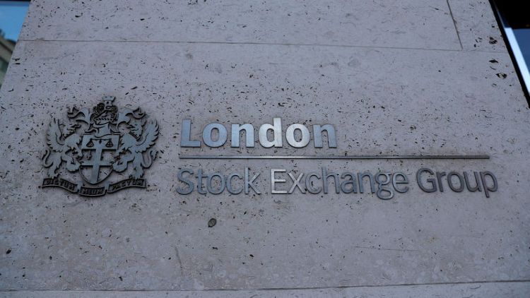 Weak pound, higher commodity stocks boost FTSE