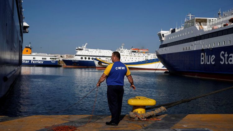 Greek ships remain docked at ports after seamen extend strike