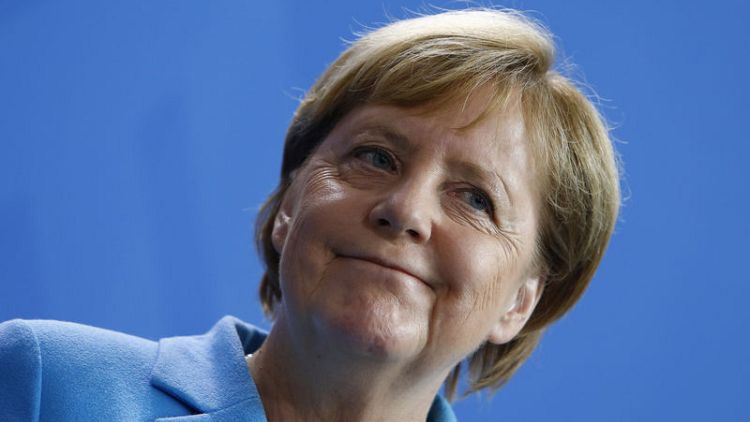 Merkel rebuffs conservative ally over far-right protests