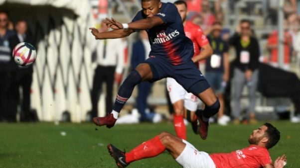 Kylian Mbappé, face à Téji Savanier, le 1er septembre, à Nîmes Kylian Mbappé, face à Téji Savanier, le 1er septembre, à Nîmes