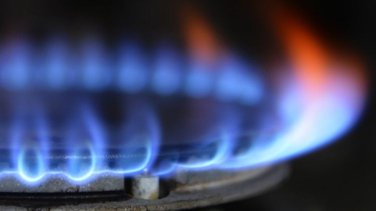 UK regulator sets energy price cap at 1,136 pounds a year