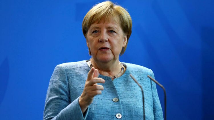 Merkel accuses far-right party of stoking ethnic tension