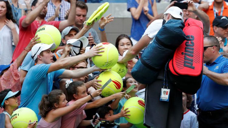 At U.S. Open, love for tennis balls is jumbo sized
