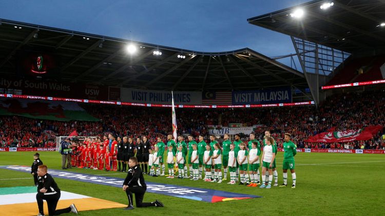Giggs enjoys memorable homecoming as Wales thrash Ireland