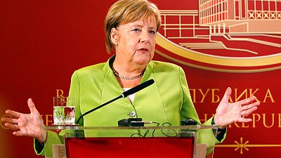 Merkel targets debt reduction, investment as tax take "very good" Merkel targets debt reduction, investment as tax take "very good"