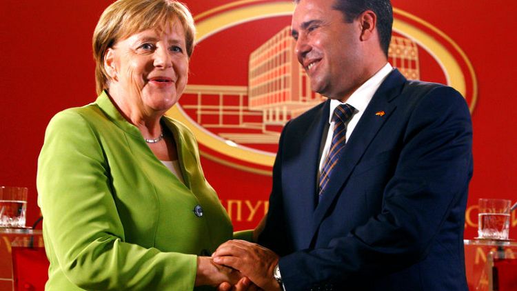 Merkel urges Macedonians to embrace name deal with Greece
