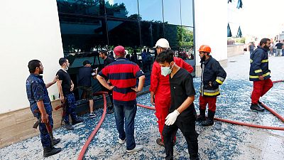 Gunmen attack headquarters of Libya's state oil firm, two staff killed Gunmen attack headquarters of Libya's state oil firm, two staff killed