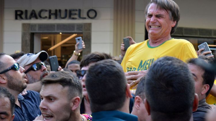 Far-right candidate Bolsonaro gains little after stabbing - poll
