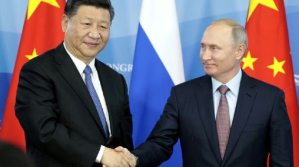 Moscou et Pékin veulent moins utiliser le dollar pour leur commerce Moscou et Pékin veulent moins utiliser le dollar pour leur commerce