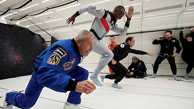 Usain Bolt toasts zero-gravity with champagne Usain Bolt toasts zero-gravity with champagne