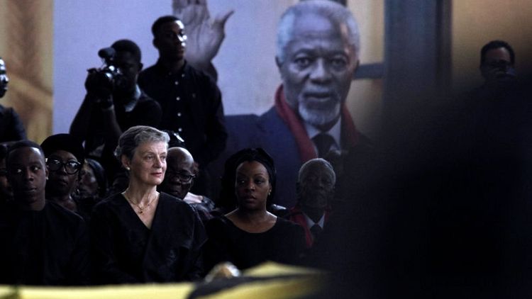 Wife of former U.N. chief Kofi Annan joins mourners around husband's casket