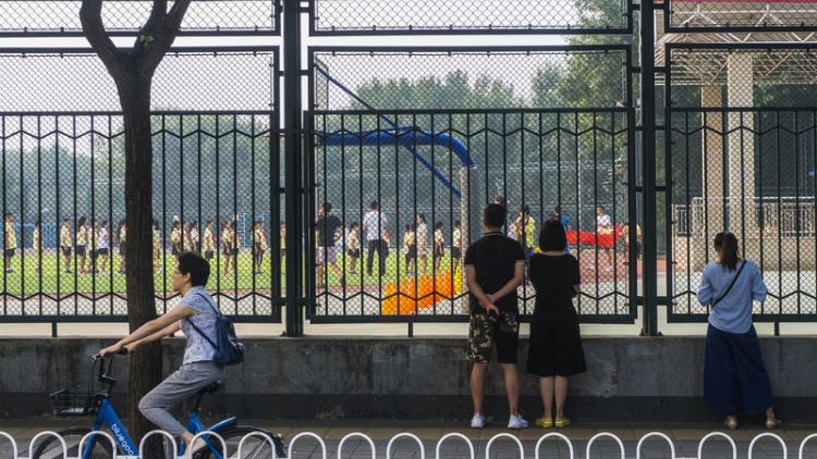 As Chinese school year starts, some Beijing residents find their kids can't get admission