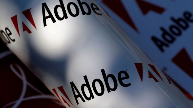 Adobe's in line revenue forecast pressures shares