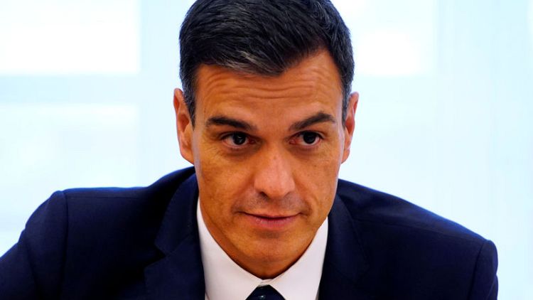 Spanish PM defends doctoral thesis against reports of plagiarism