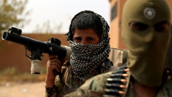 Dans l'est syrien, l'assaut décisif d'une coalition kurdo-arabe contre l'EI Dans l'est syrien, l'assaut décisif d'une coalition kurdo-arabe contre l'EI