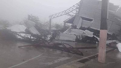 Three killed as Philippines warns of hazards in powerful typhoon's wake Three killed as Philippines warns of hazards in powerful typhoon's wake