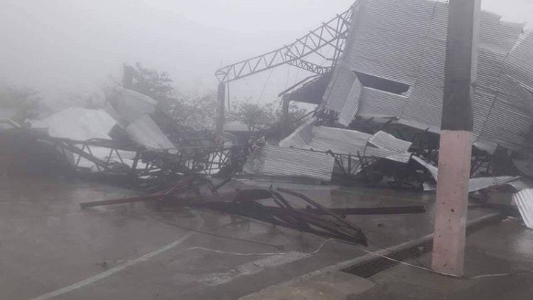 Three killed as Philippines warns of hazards in powerful typhoon's wake