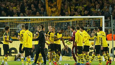 Dortmund beat Frankfurt 3-1 to go top in Bundesliga