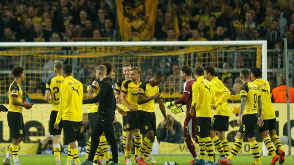 Image result for Dortmund beat Frankfurt 3-1 to go top in Bundesliga