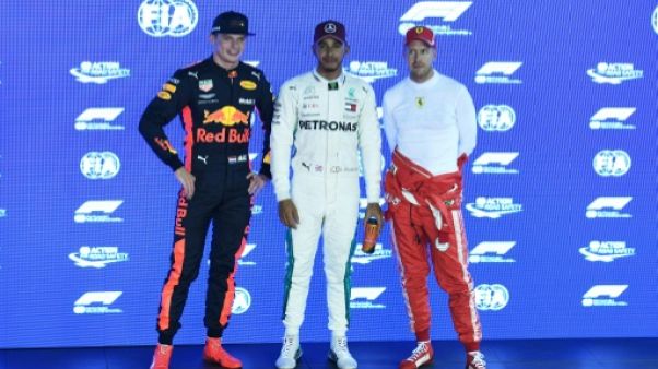 GP de Singapour: "Magic" Hamilton rayonne, Vettel fait grise mine GP de Singapour: "Magic" Hamilton rayonne, Vettel fait grise mine