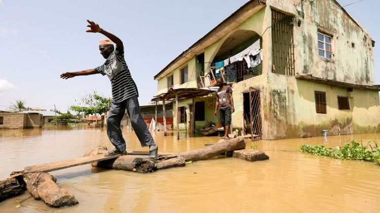 Nigeria's disasters agency says 100 people killed in floods across 10 states