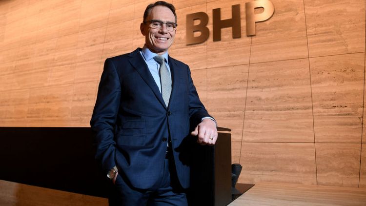 BHP chief sees pay rise trimmed on production, fatalities
