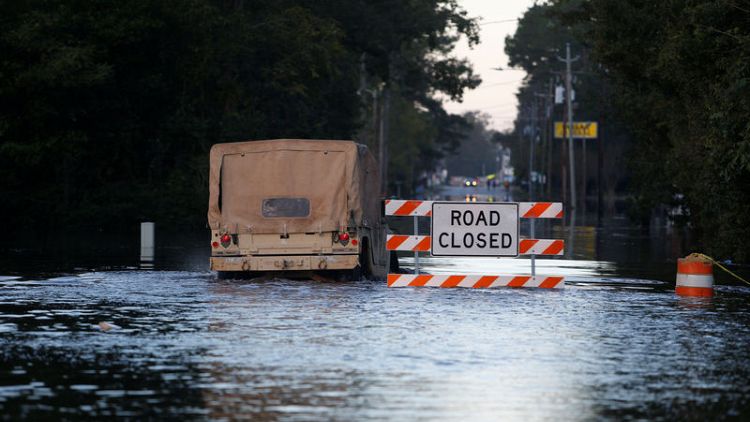 Rising flood waters from Florence menace Carolinas
