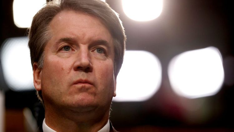 Trump defends court nominee Kavanaugh, wants to hear from accuser