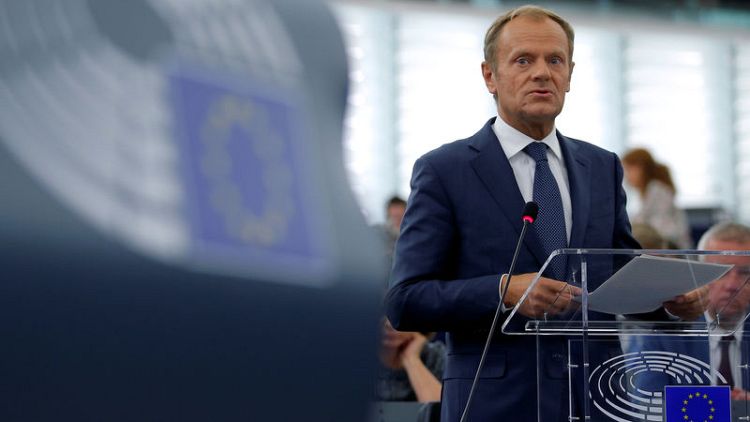 EU must end migration 'blame game' - Tusk