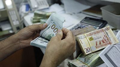 ليبيا تفرض رسوما على معاملات النقد الأجنبي لسد الفجوة مع السوق السوداء ليبيا تفرض رسوما على معاملات النقد الأجنبي لسد الفجوة مع السوق السوداء